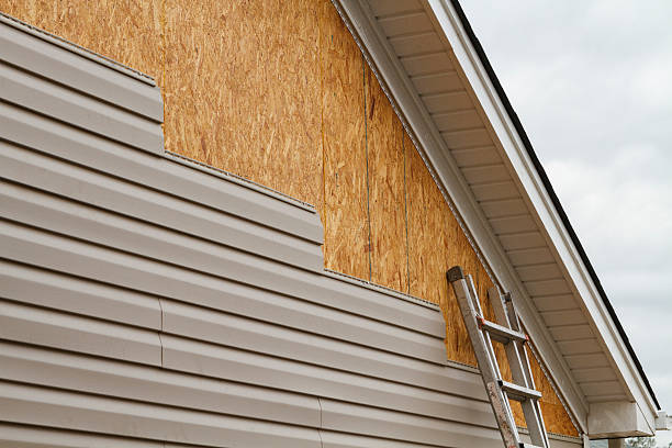 Professional Siding Installation technician working in Snow Camp, NC